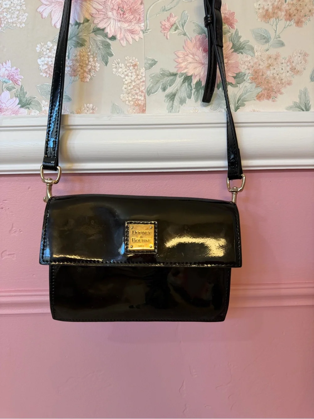 Dooney & Bourke Black Patent Leather Crossbody with Gold Plaque
